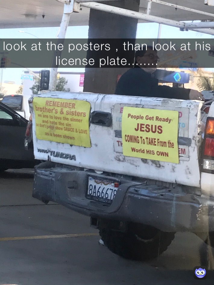 look at the posters , than look at his license plate........