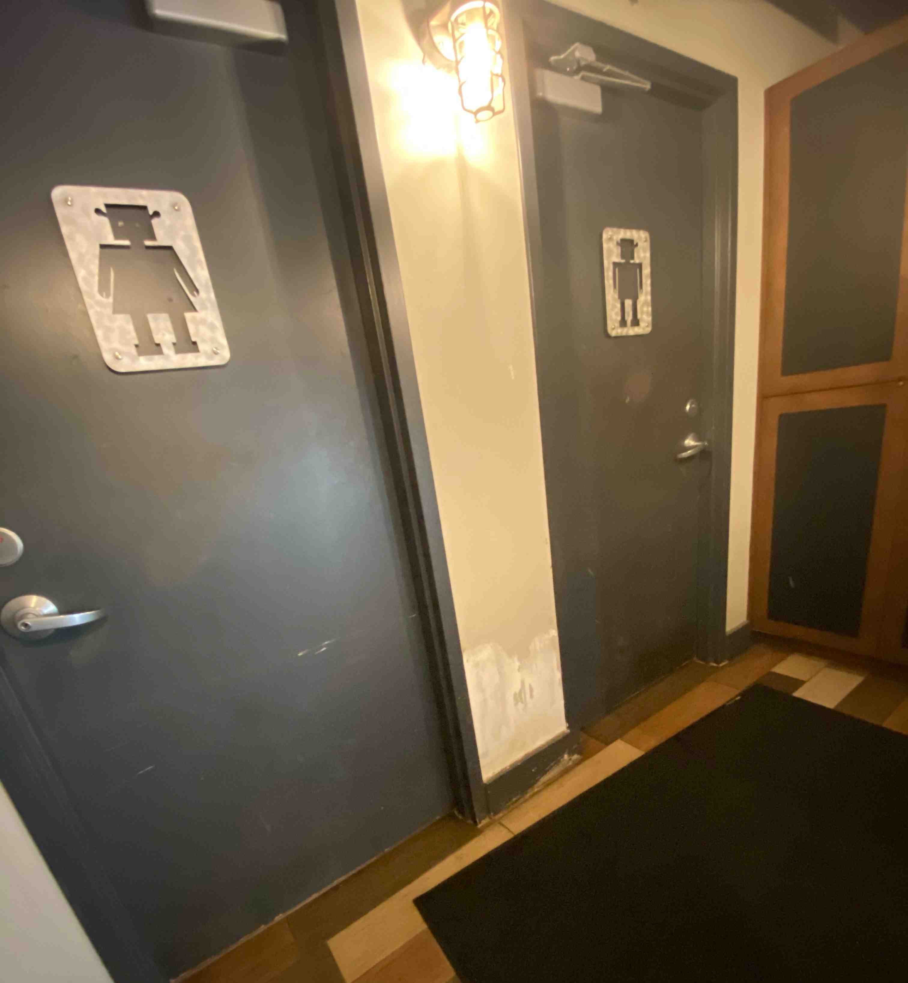 My mom took me to a college today to check it out and see if I liked it or not. On the way home we stopped and got a burger for lunch. The place we ate at had a girl and boy Shrek in the bathroom doors.