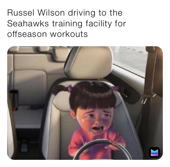 Russel Wilson driving to the Seahawks training facility for offseason workouts 