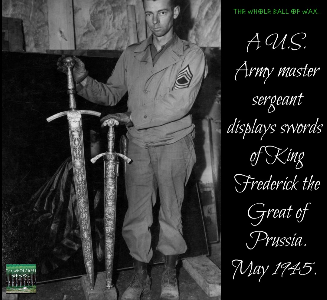 Double tap to edit A U.S. Army master sergeant displays swords of King Frederick the Great of Prussia. May 1945.