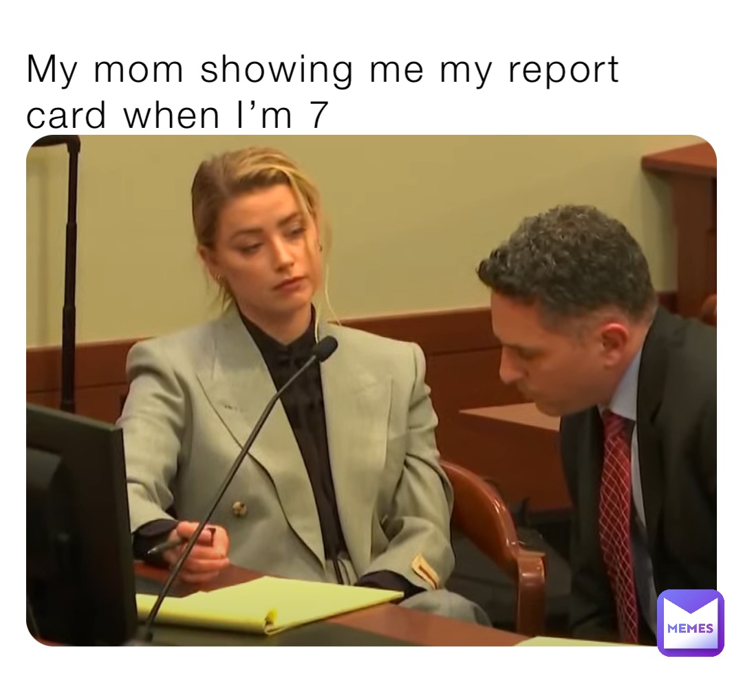 My mom showing me my report card when I’m 7