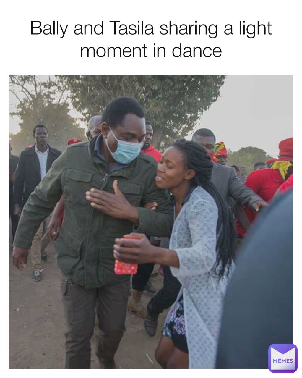 Bally and Tasila sharing a light moment in dance