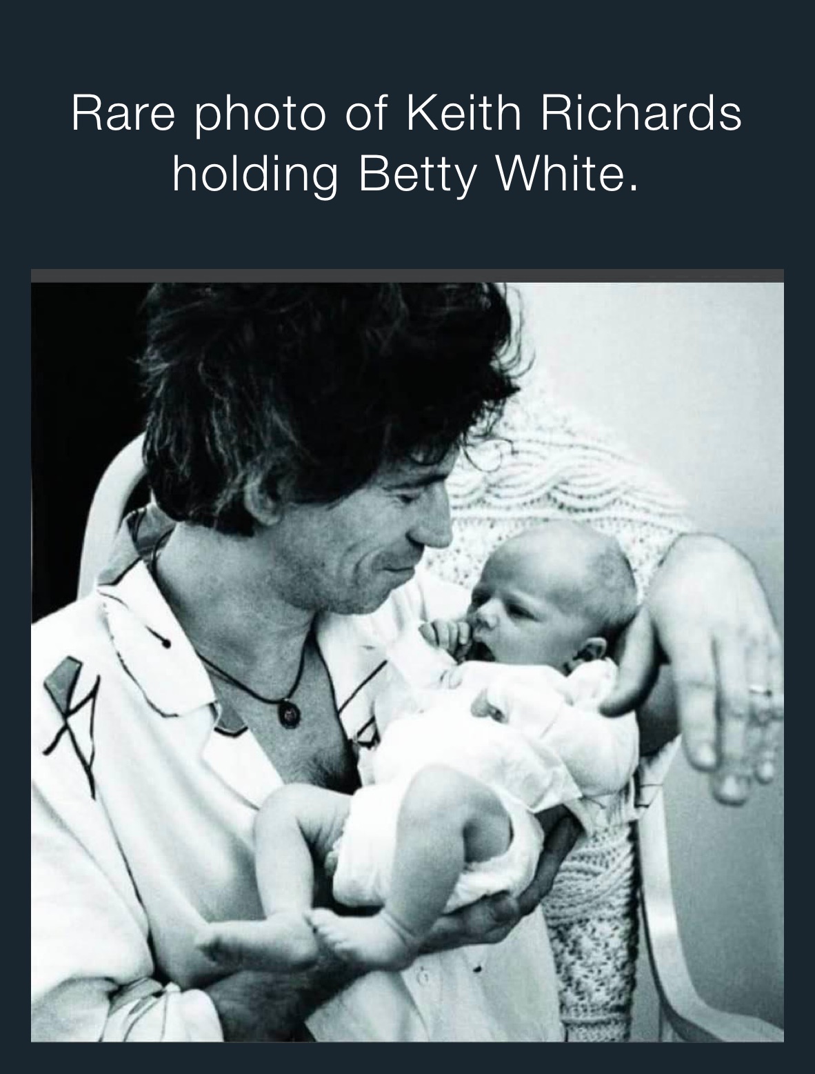 Rare photo of Keith Richards holding Betty White. 