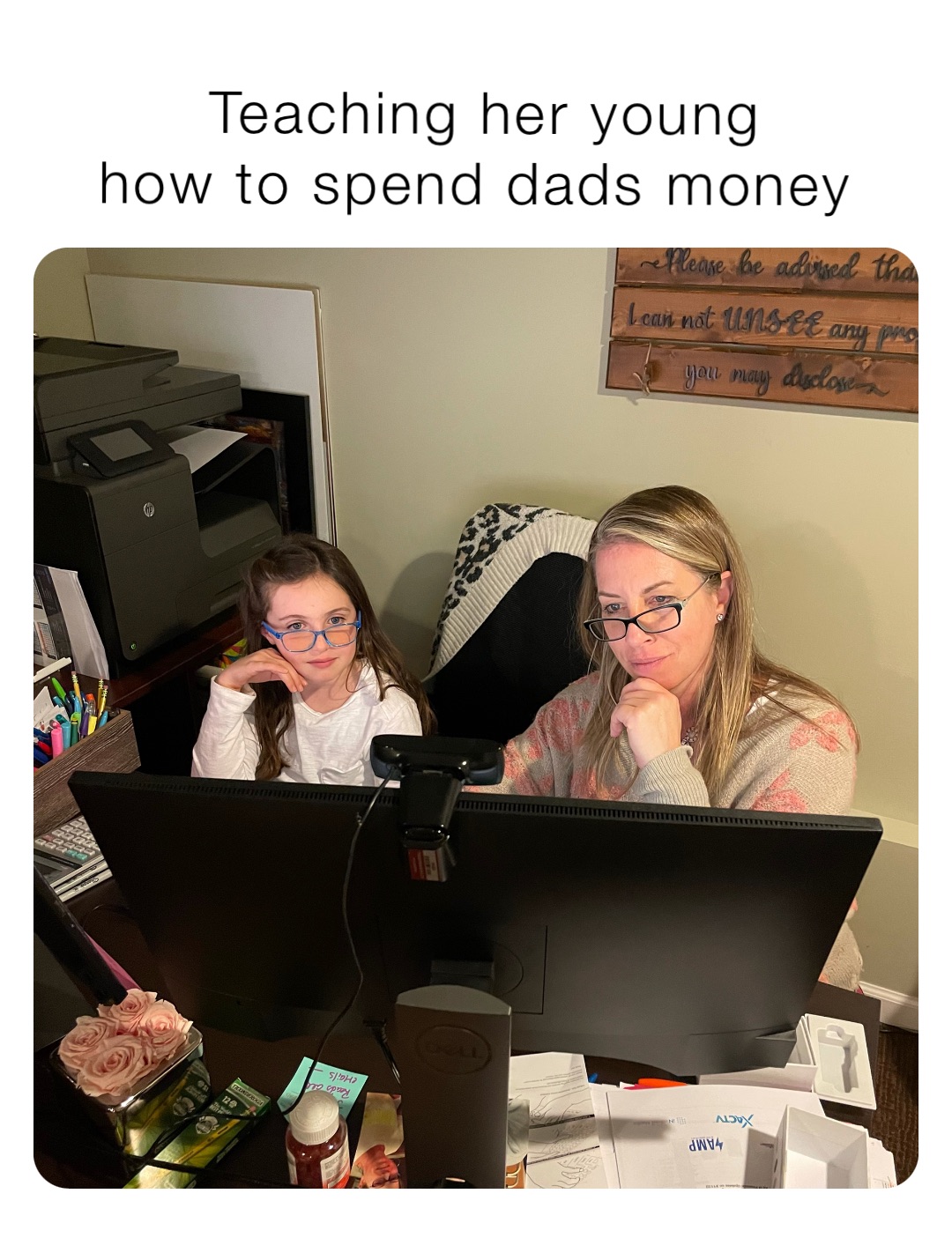 Teaching her young 
how to spend dads money